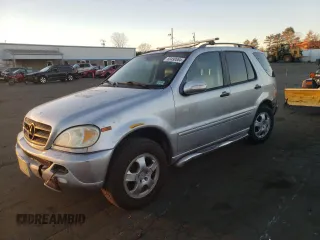 2002 Mercedes-Benz M-Class with VIN 4JGAB54E32A312131, listed as a Copart auction lot 80490084 with 165,365 mi miles and Salvage Title. Bid and sale history available at carsss.com. Image 1.
