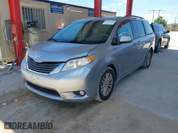 2011 Toyota Sienna XLE AAS with VIN 5TDYK3DC1BS007820, listed as a IAAI auction lot 41935200 with 123,554 mi miles. Bid and sale history available at carsss.com. Image 17.
