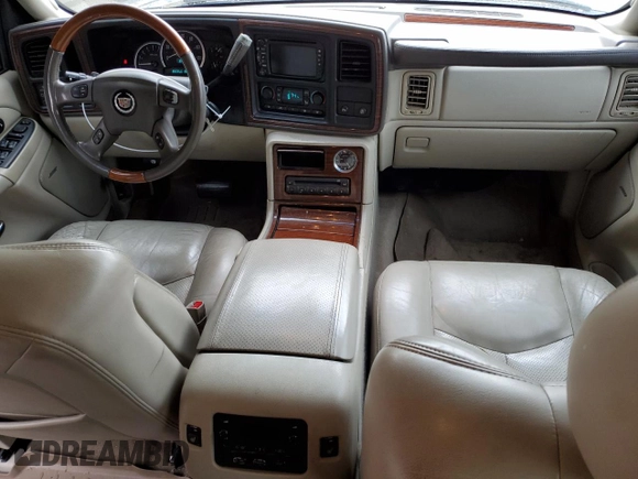 2004 Cadillac Escalade z VIN 1GYEK63N74R232309, wystawiony jako Copart lot #53099795 z przebiegiem 222 698 mil mil oraz Szkoda całkowita • Salvage title. Historia ofert i sprzedaży dostępna na DreamBid. Obrazek 8.