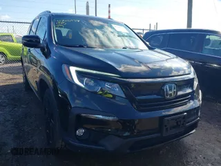 2021 Honda Pilot Special Edition with VIN 5FNYF6H29MB027960, listed as a IAAI auction lot 41726934 with 35,215 mi miles. Bid and sale history available at carsss.com. Image 1.