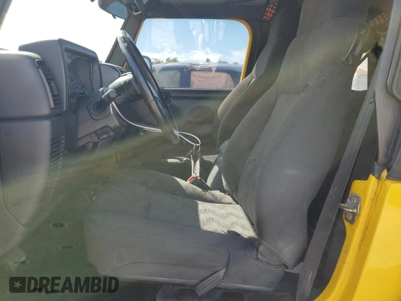 2003 Jeep Wrangler X with VIN 1J4FA39S83P368090, listed as a Copart auction lot 69773284 with 216,671 mi miles and Salvage Title. Bid and sale history available at carsss.com. Image 7.