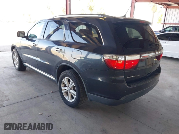 2013 Dodge Durango Crew with VIN 1C4RDHDG0DC616982, listed as a IAAI auction lot 42141275 with 178,752 mi miles. Bid and sale history available at carsss.com. Image 3.