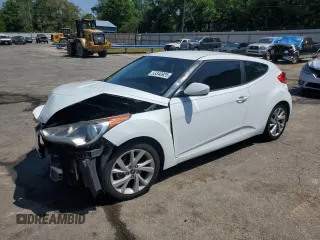 2016 Hyundai Veloster z VIN KMHTC6ADXGU284633, wystawiony jako Copart lot #53340925 z przebiegiem 124 815 mil mil oraz Szkody całkowita. Historia ofert i sprzedaży dostępna na DreamBid. Obrazek 1.