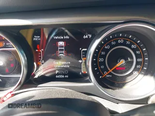 2019 Jeep Wrangler Unlimited Sahara with VIN 1C4HJXEN1KW592876, listed as a IAAI auction lot 42039474 with 66,506 mi miles and . Bid and sale history available at DreamBid. Image 7.
