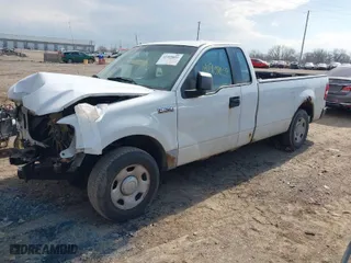 2007 Ford F-150 XL with VIN 1FTRF12277KC47847, listed as a IAAI auction lot 41909059 with 235,017 mi miles. Bid and sale history available at carsss.com. Image 2.