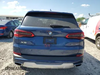 2020 BMW X5 xDrive40i with VIN 5UXCR6C00LLL66950, listed as a Copart auction lot 54584945 with 51,766 mi miles and Salvage Title. Bid and sale history available at DreamBid. Image 6.