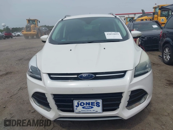 2016 Ford Escape Titanium with VIN 1FMCU9JX6GUB50226, listed as a IAAI auction lot 42033033 with 108,782 mi miles and . Bid and sale history available at DreamBid. Image 12.
