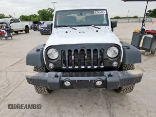 2016 Jeep Wrangler Black Bear with VIN 1C4AJWAG0GL104173, listed as a Copart auction lot 63565415 with 52,922 mi miles and Salvage title. Bid and sale history available at DreamBid. Image 5.