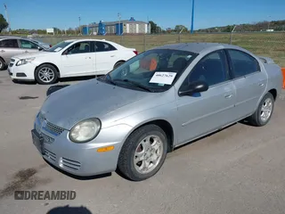 2003 Dodge Neon SXT with VIN 1B3ES56C43D215636, listed as a IAAI auction lot 40627629 with 121,237 mi miles. Bid and sale history available at carsss.com. Image 2.