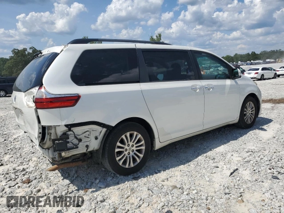 2015 Toyota Sienna XLE with VIN 5TDYK3DC0FS543020, listed as a Copart auction lot 61479225 with 221,814 mi miles and Salvage title. Bid and sale history available at DreamBid. Image 3.