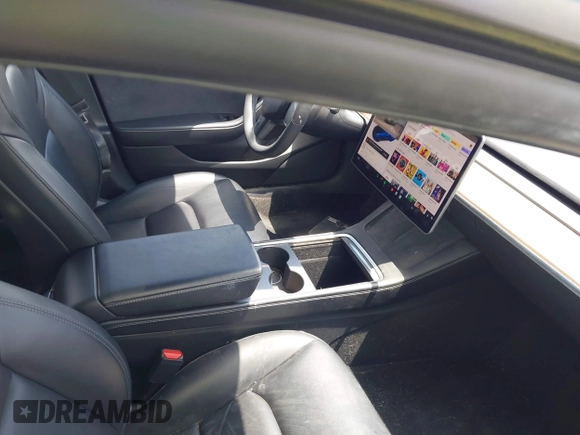 2021 Tesla Model 3 Standard Range Plus z VIN 5YJ3E1EAXMF098855, wystawiony jako IAAI lot #42226127 z przebiegiem 34 351 mil mil oraz . Historia ofert i sprzedaży dostępna na DreamBid. Obrazek 5.