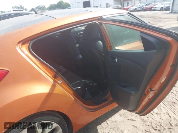 2012 Hyundai Veloster w/Gray Int z VIN KMHTC6AD5CU074516, wystawiony jako IAAI lot #42061623 z przebiegiem 133 338 mil mil oraz . Historia ofert i sprzedaży dostępna na DreamBid. Obrazek 8.