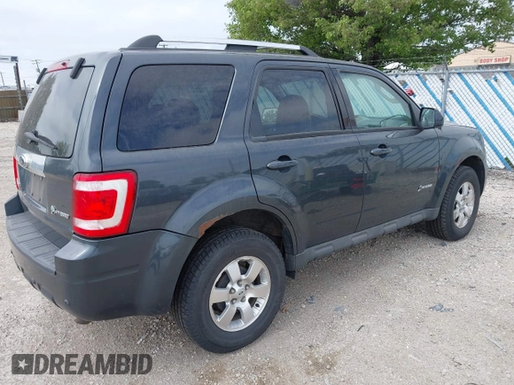 2009 Ford Escape Hybrid z VIN 1FMCU49319KC34926, wystawiony jako IAAI lot #42295564 z przebiegiem 125 648 mil mil oraz . Historia ofert i sprzedaży dostępna na DreamBid. Obrazek 4.