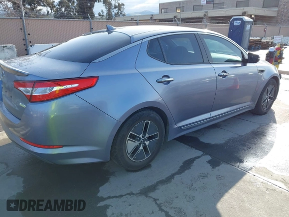 2012 Kia Optima Hybrid with VIN KNAGM4AD6C5015831, listed as a IAAI auction lot 41807913 with 156,197 mi miles. Bid and sale history available at carsss.com. Image 4.