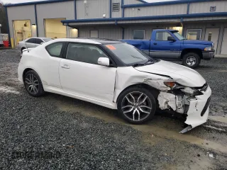 2014 Scion tC z VIN JTKJF5C78E3086696, wystawiony jako Copart lot #84040544 z przebiegiem 83 973 mil mil oraz Szkoda całkowita • Salvage title. Historia ofert i sprzedaży dostępna na DreamBid. Obrazek 4.