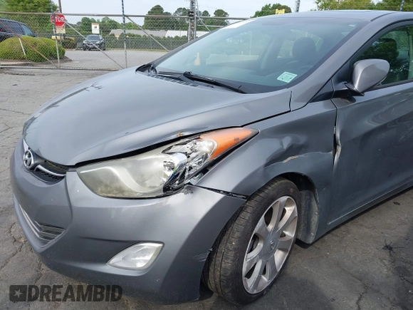 2013 Hyundai Elantra Limited z VIN 5NPDH4AEXDH384227, wystawiony jako IAAI lot #42106321 z przebiegiem 145 862 mil mil oraz . Historia ofert i sprzedaży dostępna na DreamBid. Obrazek 6.