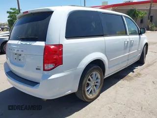 2014 Dodge Grand Caravan SXT with VIN 2C4RDGCG1ER429495, listed as a IAAI auction lot 42058513 with 136,936 mi miles and . Bid and sale history available at DreamBid. Image 4.