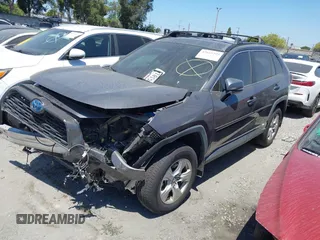 2020 Toyota RAV4 Hybrid XLE with VIN 2T3RWRFV5LW058103, listed as a IAAI auction lot 42665299 with 112,634 mi miles and . Bid and sale history available at DreamBid. Image 20.