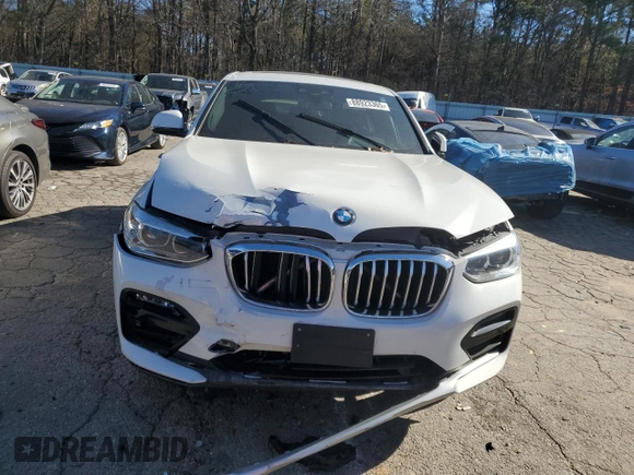 2020 BMW X4 xDrive30i with VIN 5UX2V1C05LLE67723, listed as a Copart auction lot 88923365 with 0 mi miles and Salvage Title. Bid and sale history available at carsss.com. Image 5.