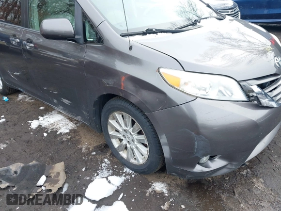 2012 Toyota Sienna XLE with VIN 5TDDK3DC9CS047014, listed as a IAAI auction lot 41551585 with 164,440 mi miles. Bid and sale history available at carsss.com. Image 6.