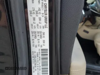 2014 Dodge Durango Citadel z VIN 1C4RDJEG8EC598108, wystawiony jako Copart lot #52485325 z przebiegiem 137 179 mil mil oraz Szkoda całkowita • Salvage title. Historia ofert i sprzedaży dostępna na DreamBid. Obrazek 16.