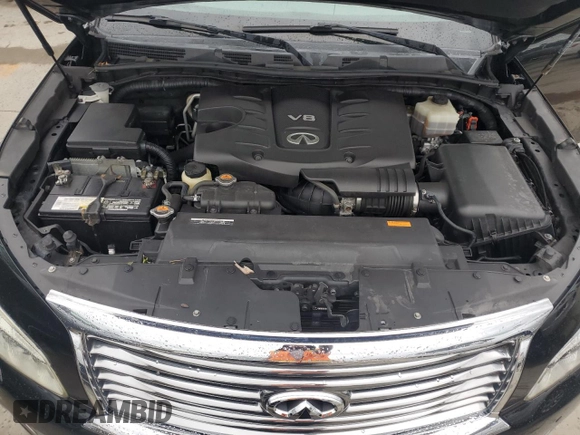 2012 Infiniti QX56 7-passenger with VIN JN8AZ2NF8C9518669, listed as a Copart auction lot 74218614 with 0 mi miles and Non Repairable. Bid and sale history available at carsss.com. Image 12.