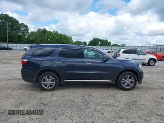 2013 Dodge Durango Crew with VIN 1C4RDHDG7DC657898, listed as a IAAI auction lot 42522353 with 234,483 mi miles and . Bid and sale history available at DreamBid. Image 13.
