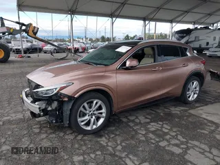 2017 Infiniti QX30 z VIN SJKCH5CP0HA021221, wystawiony jako IAAI lot #41771213 z przebiegiem 88 351 mil mil oraz . Historia ofert i sprzedaży dostępna na DreamBid. Obrazek 18.