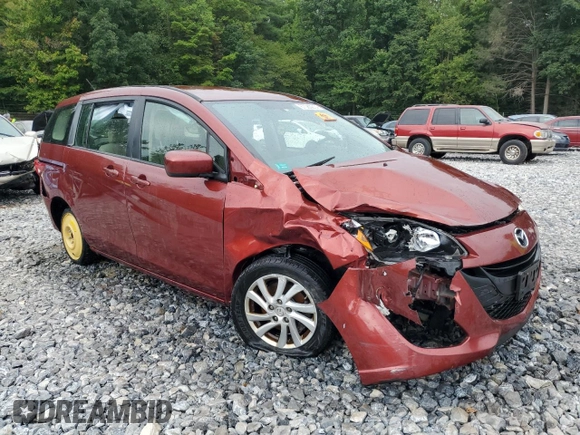 2012 Mazda 5 Sport with VIN JM1CW2BL4C0128082, listed as a Copart auction lot 67080914 with Not Provided miles and Salvage Title. Bid and sale history available at DreamBid. Image 4.