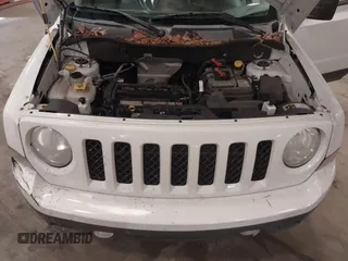 2014 Jeep Patriot Latitude with VIN 1C4NJPFA3ED739925, listed as a IAAI auction lot 41623546 with 130,374 mi miles and . Bid and sale history available at carsss.com. Image 10.