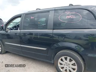 2016 Chrysler Town & Country Touring with VIN 2C4RC1BG7GR287707, listed as a IAAI auction lot 42136625 with 86,684 mi miles and . Bid and sale history available at DreamBid. Image 14.