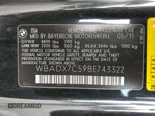 2011 BMW 3 Series 335i with VIN WBADX7C59BE743322, listed as a Copart auction lot 84219074 with 94,623 mi miles and Salvage Title. Bid and sale history available at carsss.com. Image 12.