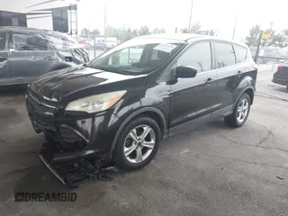 2015 Ford Escape SE with VIN 1FMCU0GXXFUC80317, listed as a IAAI auction lot 42047476 with 230,381 mi miles and . Bid and sale history available at DreamBid. Image 2.