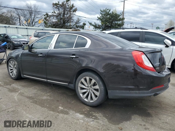 2013 Lincoln MKS with VIN 1LNHL9DKXDG601256, listed as a Copart auction lot 51078365 with 210,644 mi miles and Salvage Title. Bid and sale history available at carsss.com. Image 2.