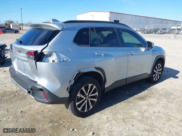 2022 Toyota Corolla Cross XLE with VIN 7MUDAAAG4NV004482, listed as a IAAI auction lot 41631653 with 64,746 mi miles. Bid and sale history available at carsss.com. Image 4.