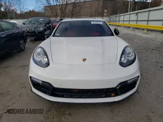 2014 Porsche Panamera z VIN WP0AA2A74EL010108, wystawiony jako Copart lot #85194254 z przebiegiem 77 568 mil mil oraz Czysty tytuł • Clean title. Historia ofert i sprzedaży dostępna na DreamBid. Obrazek 5.