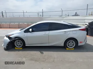 2017 Toyota Prius Plus z VIN JTDKARFPXH3053894, wystawiony jako IAAI lot #42208119 z przebiegiem 115 439 mil mil oraz . Historia ofert i sprzedaży dostępna na DreamBid. Obrazek 14.