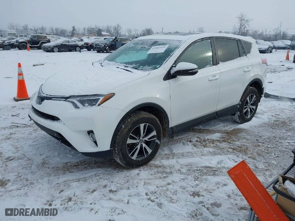 2018 Toyota RAV4 XLE with VIN 2T3RFREV1JW792915, listed as a IAAI auction lot 41607455 with 67,840 mi miles. Bid and sale history available at carsss.com. Image 2.