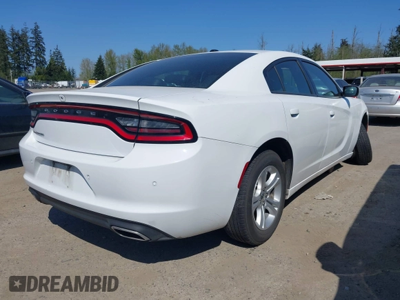 2022 Dodge Charger SXT with VIN 2C3CDXBG4NH197301, listed as a IAAI auction lot 42053688 with 60,592 mi miles and . Bid and sale history available at DreamBid. Image 4.