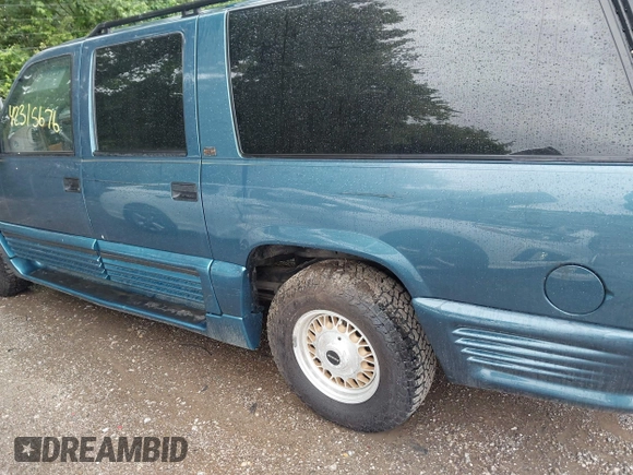 1995 GMC Suburban with VIN 1GDFK16K8SJ741041, listed as a IAAI auction lot 42315676 with 159,312 mi miles and . Bid and sale history available at DreamBid. Image 14.