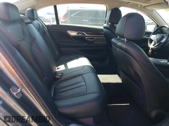 2018 BMW 7 Series 740e xDrive with VIN WBA7J2C55JG938385, listed as a Copart auction lot 49109985 with 81,567 mi miles and Salvage Title. Bid and sale history available at DreamBid. Image 10.