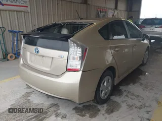2011 Toyota Prius I with VIN JTDKN3DU2B1447144, listed as a IAAI auction lot 41887553 with 104,860 mi miles. Bid and sale history available at carsss.com. Image 4.