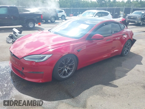 2021 Tesla Model S Plaid z VIN 5YJSA1E69MF439987, wystawiony jako IAAI lot #42496725 z przebiegiem 25 mil mil oraz . Historia ofert i sprzedaży dostępna na DreamBid. Obrazek 19.