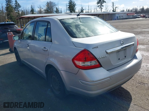 2009 Nissan Versa 1.8 S with VIN 3N1BC11E19L375222, listed as a IAAI auction lot 41736533 with 197,946 mi miles. Bid and sale history available at carsss.com. Image 3.