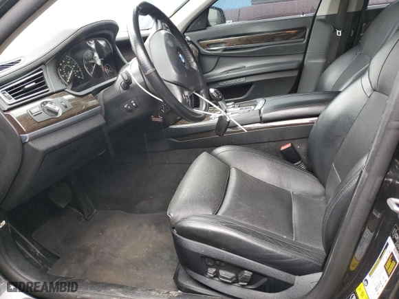 2012 BMW 7 Series 750i xDrive with VIN WBAKC6C52CC396443, listed as a Copart auction lot 44333945 with 134,075 mi miles and Salvage Title. Bid and sale history available at carsss.com. Image 7.