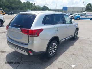 2020 Mitsubishi Outlander ES with VIN JA4AZ3A35LZ021814, listed as a IAAI auction lot 42455892 with 78,670 mi miles and . Bid and sale history available at DreamBid. Image 4.