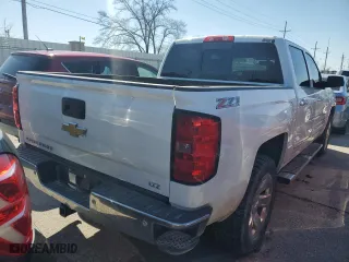 2015 Chevrolet Silverado 1500 LTZ with VIN 3GCUKSEC0FG140371, listed as a Copart auction lot 47808155 with 290,335 mi miles and Salvage Title. Bid and sale history available at carsss.com. Image 3.