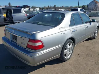 1999 Infiniti Q45 z VIN JNKBY31A8XM603290, wystawiony jako IAAI lot #41668113 z przebiegiem 144 251 mil mil oraz . Historia ofert i sprzedaży dostępna na DreamBid. Obrazek 4.