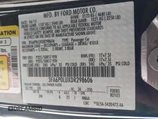 2013 Ford Fusion SE Hybrid with VIN 3FA6P0LUXDR298606, listed as a IAAI auction lot 41976525 with 121,660 mi miles. Bid and sale history available at carsss.com. Image 9.