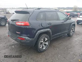 2014 Jeep Cherokee Trailhawk with VIN 1C4PJMBB5EW120432, listed as a IAAI auction lot 41973114 with 88,795 mi miles. Bid and sale history available at carsss.com. Image 4.